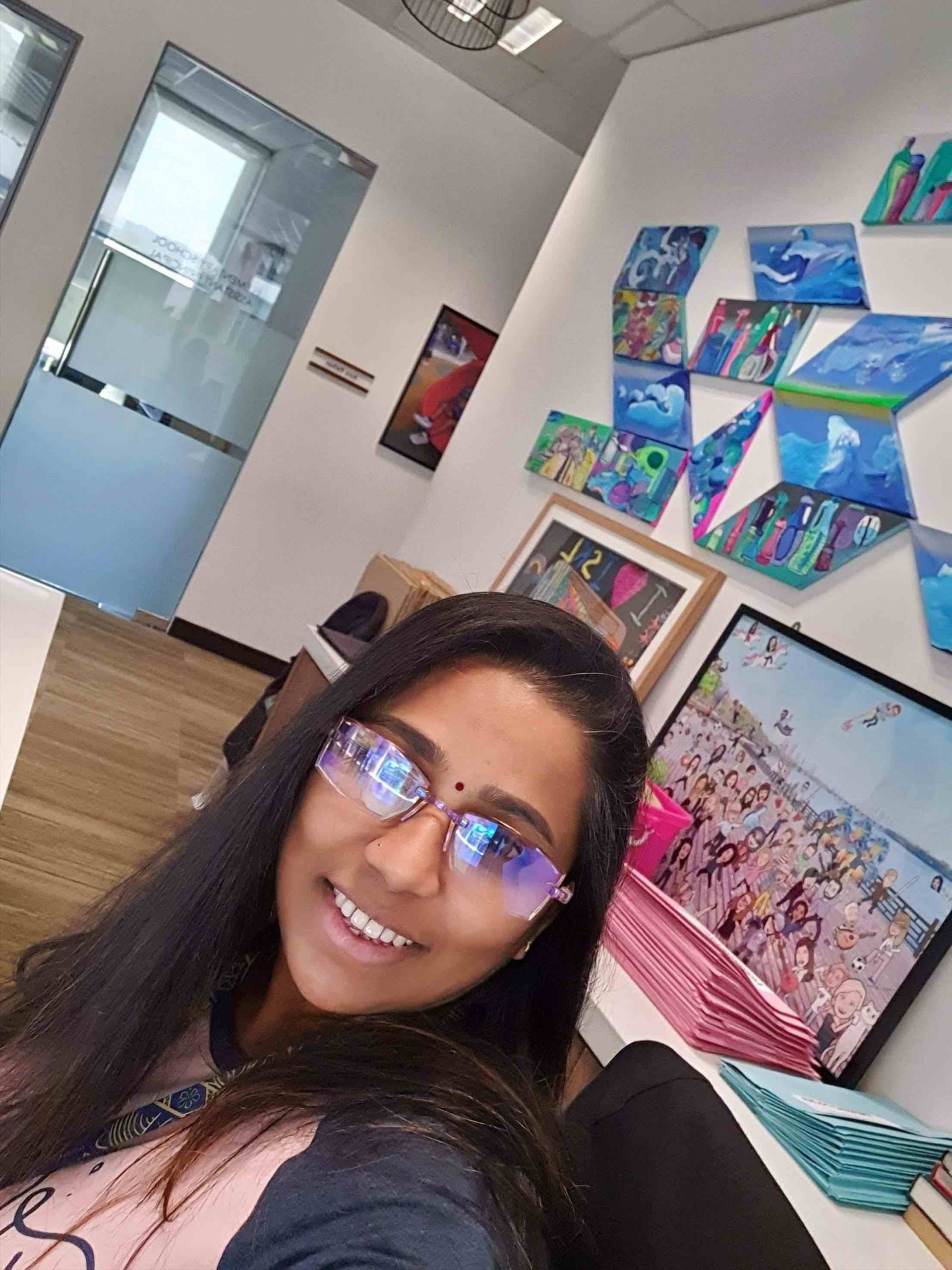 Komathi at the office